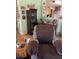 A living room with built-in dark-wood curio cabinet at 40047 N Cassara Dr, San Tan Valley, AZ 85140