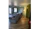 Living Room featuring hardwood floor, recliner, and lots of natural light at 40047 N Cassara Dr, San Tan Valley, AZ 85140