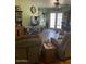 Living room showcasing hardwood floors, a ceiling fan and patio doors at 40047 N Cassara Dr, San Tan Valley, AZ 85140