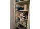Efficient pantry with shelves stocked with various items for optimal organization at 40047 N Cassara Dr, San Tan Valley, AZ 85140