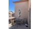 Outdoor patio area featuring a table, chairs, and privacy wall at 40047 N Cassara Dr, San Tan Valley, AZ 85140