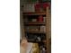 Shelves overflowing with clutter at 40047 N Cassara Dr, San Tan Valley, AZ 85140