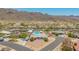 View of a home and backyard featuring a private pool and neighborhood homes at 405 E Thunderbird Trl, Phoenix, AZ 85042