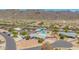 View of a home and backyard featuring a private pool and neighborhood homes at 405 E Thunderbird Trl, Phoenix, AZ 85042
