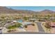 View of a home and backyard featuring a private pool and neighborhood homes at 405 E Thunderbird Trl, Phoenix, AZ 85042