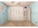Bedroom with closet, ceiling fan, and light blue walls with peeling paint at 405 E Thunderbird Trl, Phoenix, AZ 85042
