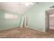 Bedroom featuring natural light, ceiling fan, and ensuite access at 405 E Thunderbird Trl, Phoenix, AZ 85042