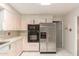 Kitchen featuring stainless steel appliances and a functional layout at 405 E Thunderbird Trl, Phoenix, AZ 85042