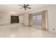 Vintage living room with view of dining room at 405 E Thunderbird Trl, Phoenix, AZ 85042