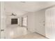 Spacious living room with tile floors and natural light at 405 E Thunderbird Trl, Phoenix, AZ 85042