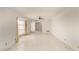 Open living room space features tile flooring and lots of natural light at 405 E Thunderbird Trl, Phoenix, AZ 85042