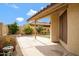 Inviting backyard features a covered patio, lush landscaping, and a private setting for outdoor enjoyment at 4790 E Navajo St, Phoenix, AZ 85044