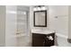 Bathroom featuring updated vanity, and views of the laundry room at 4790 E Navajo St, Phoenix, AZ 85044