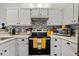 Updated kitchen with white cabinets, stainless steel appliances, subway tile and modern finishes at 4901 E Kelton Ln # 1270, Scottsdale, AZ 85254