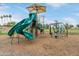 playground equipment in community park with shade and a soft landing at 5218 N Tiller Dr, Litchfield Park, AZ 85340