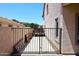 Fenced backyard providing a secure outdoor space with potential for customization at 537 S 153Rd Ln, Goodyear, AZ 85338