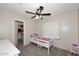 Bedroom with carpet, and white trim, and a closet at 537 S 153Rd Ln, Goodyear, AZ 85338
