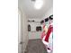 Spacious walk-in closet with shelving and clothes racks at 537 S 153Rd Ln, Goodyear, AZ 85338