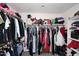 Spacious walk-in closet with abundant hanging and shelving storage at 537 S 153Rd Ln, Goodyear, AZ 85338