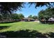 Expansive community park with lush green space and covered picnic area at 537 S 153Rd Ln, Goodyear, AZ 85338