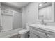 Bathroom featuring a white shower, toilet and sink at 5436 E Aspen E Ave, Mesa, AZ 85206
