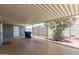 Covered patio with a mature tree at 5436 E Aspen E Ave, Mesa, AZ 85206