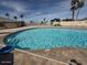 Community pool featuring crystal clear water and ample space for relaxing and swimming at 5436 E Aspen E Ave, Mesa, AZ 85206