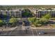 Community entrance with lush landscaping and access to residential buildings beyond at 5450 E Deer Valley Dr # 2191, Phoenix, AZ 85054