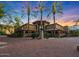 Luxury apartment complex with palm trees and brick driveway showcasing a well-maintained exterior at 5450 E Deer Valley Dr # 2191, Phoenix, AZ 85054