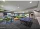 Inviting game room equipped with a ping pong table, foosball, and cozy seating for residents' enjoyment at 5450 E Deer Valley Dr # 2191, Phoenix, AZ 85054