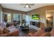 Cozy living room with stylish furnishings, a ceiling fan, and a view of the outside at 5450 E Deer Valley Dr # 2191, Phoenix, AZ 85054