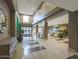 Spacious lobby with tile flooring, comfortable seating, and large windows, creating a welcoming atmosphere at 5450 E Deer Valley Dr # 2191, Phoenix, AZ 85054