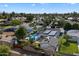 Aerial shot of a house, highlighting the backyard with a pool, patio, and solar panels on the roof at 5707 N 12Th Pl, Phoenix, AZ 85014
