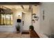 Inviting front porch with white door, decorative planters, and a welcome mat at 5707 N 12Th Pl, Phoenix, AZ 85014