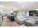 Spacious open-concept living room and kitchen with stylish decor and modern finishes at 5707 N 12Th Pl, Phoenix, AZ 85014