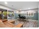 Cozy living space with modern furnishings and a seamless transition to the outdoor patio at 5707 N 12Th Pl, Phoenix, AZ 85014