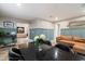 Open concept living and dining area featuring a sliding door and comfortable seating at 5707 N 12Th Pl, Phoenix, AZ 85014
