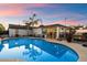 Beautiful pool area with lush landscaping, offering a relaxing and private outdoor retreat at 5707 N 12Th Pl, Phoenix, AZ 85014