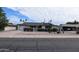 Charming single-story home featuring a well-kept desert landscape and a two-car garage at 5720 E University Dr, Mesa, AZ 85205