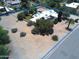 Spacious property featuring desert landscaping and mature trees, with ample space for custom outdoor features at 5905 E Donna Ln, Paradise Valley, AZ 85253