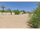 View of a large, fenced backyard space with desert landscaping, perfect for custom landscaping and outdoor activities at 5905 E Donna Ln, Paradise Valley, AZ 85253