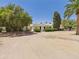 Spacious property featuring desert landscaping and mature trees, perfect for serene outdoor living at 5905 E Donna Ln, Paradise Valley, AZ 85253