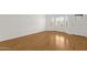 Inviting entryway features wood-look flooring, a stylish front door and natural light at 6546 E Dallas St, Mesa, AZ 85205