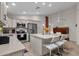Spacious kitchen with a large island, stainless steel appliances, and tiled floors at 6546 E Dallas St, Mesa, AZ 85205