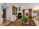 View of an inviting living room featuring hardwood floors, comfortable seating, and elegant decor at 6546 E Dallas St, Mesa, AZ 85205