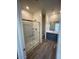 Modern bathroom featuring a glass shower, vanity with sink, and neutral-toned walls at 658 S Maricopa Rd, Florence, AZ 85132