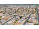 Wide aerial shot of a residential area and identifying a particular home at 6938 W Nicolet Ave, Glendale, AZ 85303