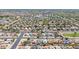 Expansive aerial view of a well-maintained neighborhood featuring uniform homes and neatly arranged streets at 6938 W Nicolet Ave, Glendale, AZ 85303