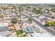 Captivating aerial view of homes with unique desert landscaping in a vibrant neighborhood setting at 6938 W Nicolet Ave, Glendale, AZ 85303