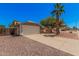 Well-kept home with a two-car garage, mature trees, and a tidy front yard in a quiet neighborhood at 7426 W Cholla St, Peoria, AZ 85345